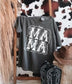 Gray t-shirt with 'MAMA' print on a wooden stand against a cowhide rug.